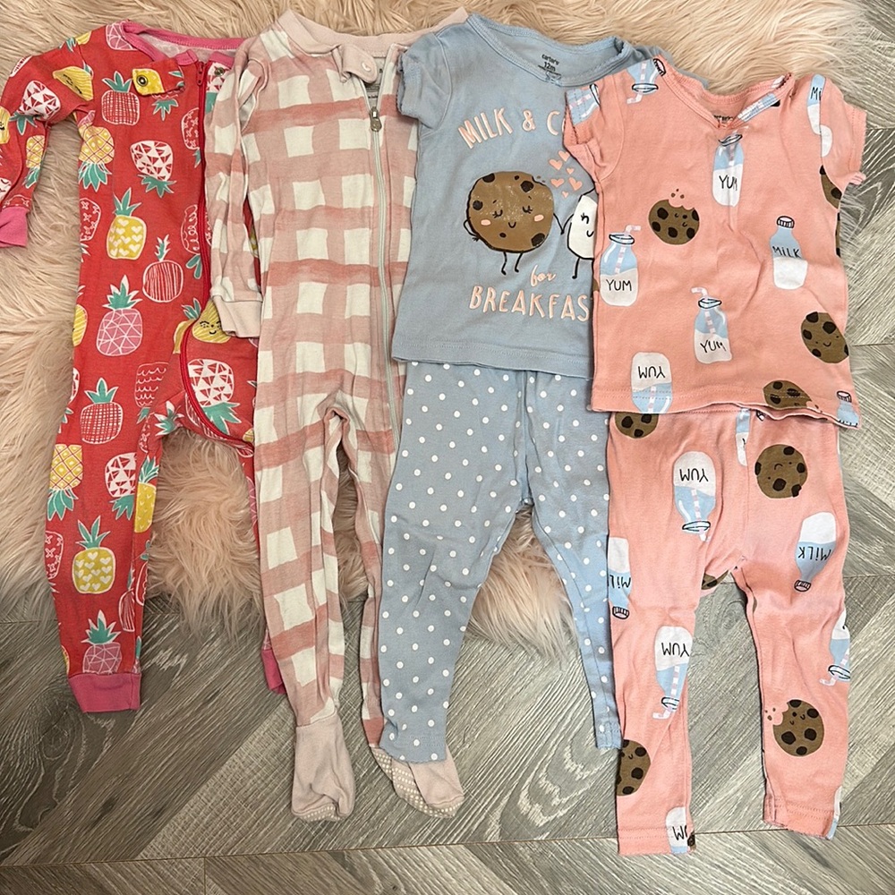 Bundle of 8 sets of PJs. Burt’s bees; Hanna Anderson; Lamaze; carters
